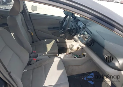 2011 Honda Insight z USA, uszkodzony, nr VIN JHMZE2H36BS008807